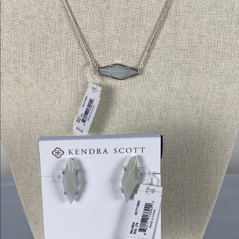 Kendra Scott Rhodium iridescent stone set.